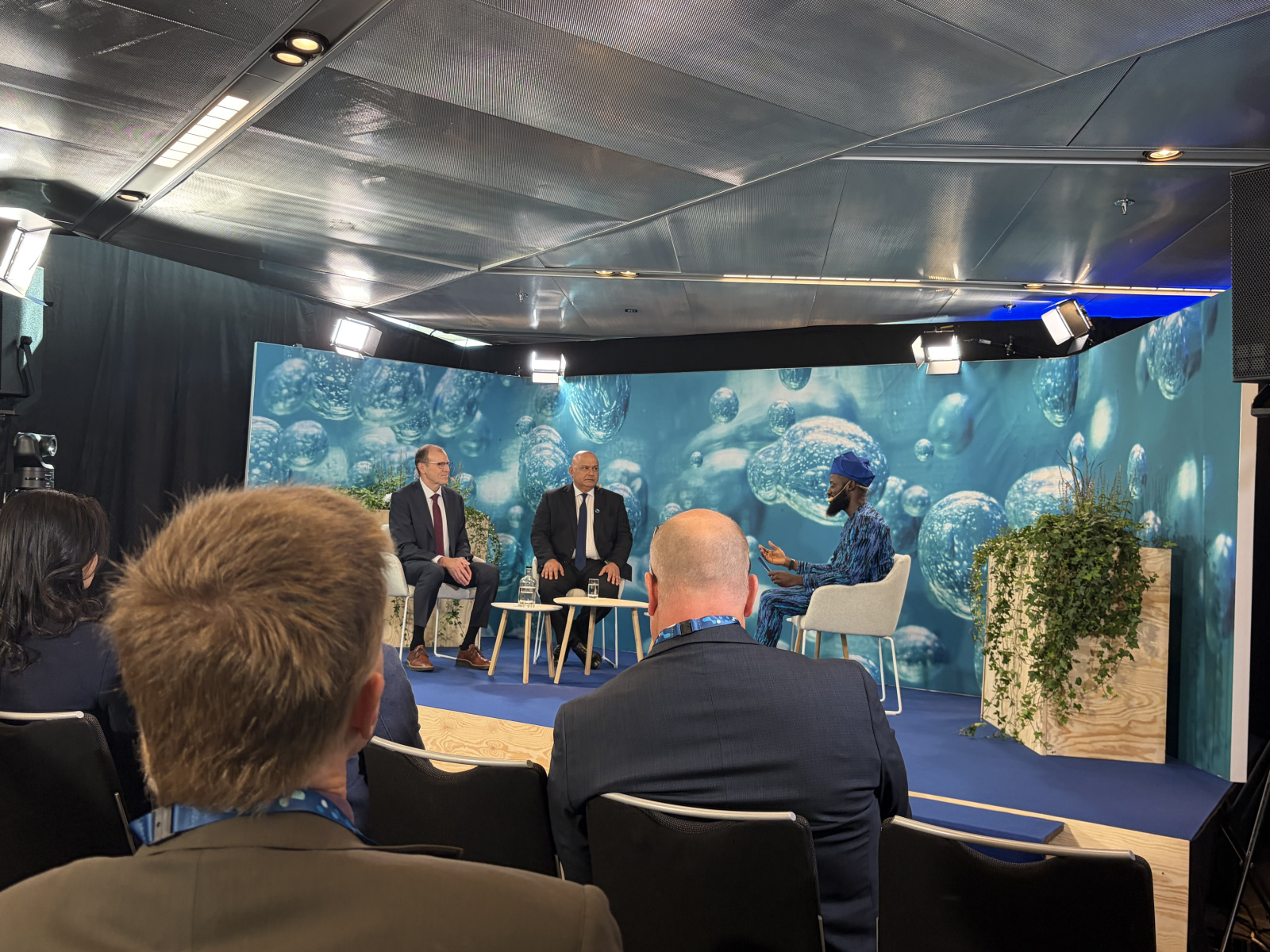 group panel sitting on stage