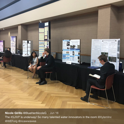 Students by poster presentations