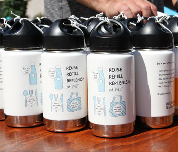 Close up of water bottles on table