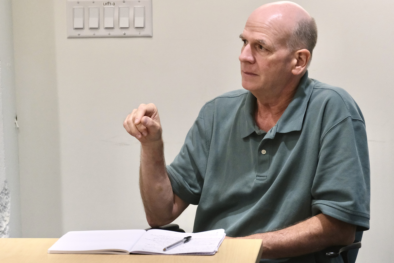 Rob Vincent giving a presentation in a conference room setting