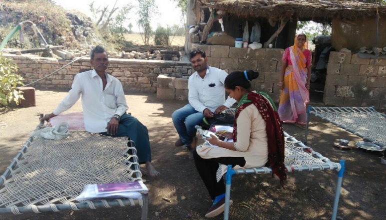Researchers conduct surveys with farmer in India
