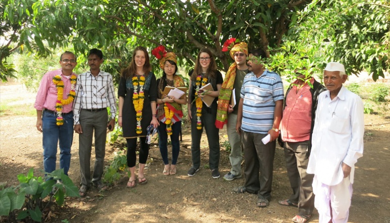 Photo of Research team under tree