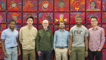 Six Members of the Doyle Group stand against a red tapestry with different faces. The people are: undergraduate students Andre Hamelberg and Ian Chen, Professor Patrick Doyle, Devashish Gokhale PhD '24, and undergraduate students Andrew Okyere and Dien Nguyen. 