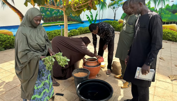 5 people participating in the training program