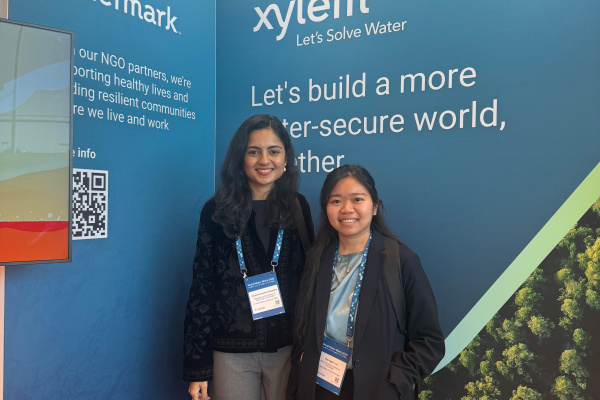 2026 Stockholm grantees in front of Xylem poster