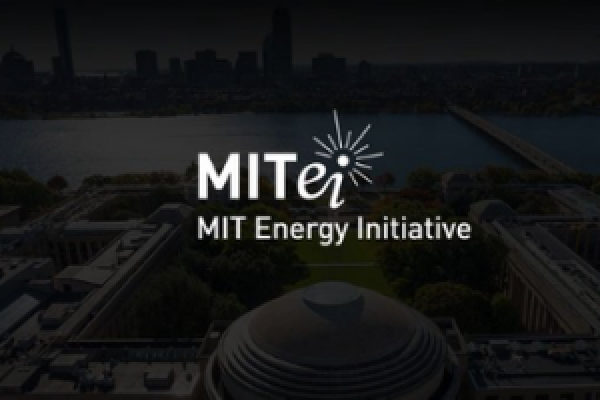MIT Energy Initiative Logo over a darkened scene of the MIT Campus