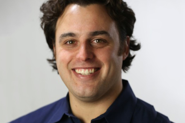 headshot of Amos Winter