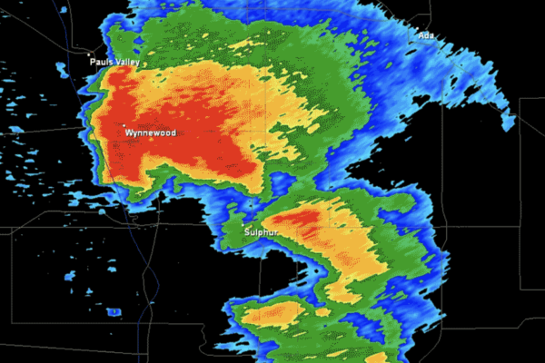 screenshot of weather radar, colorful geographical key of intensity (red) to light weather (blue) report