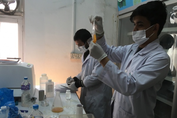 Nepalese scientists make vials in lab