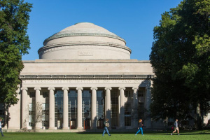 People walking past the MIT Great Dome building