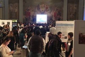 Water night attendees walking through poster sessions