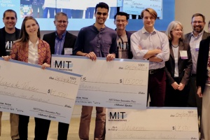 Winners of MIT Water Night holding checks