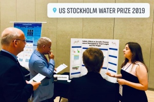 Student presenting project to judges