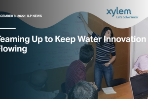 The words "teaming up to keep water innovation flowing" with a background of people looking at a whiteboard.
