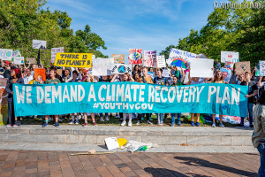 Young people at the DC Youth Climate Strike 2019 at the U.S. Capitol. They are holding a banner that says "We demand a climate recovery plan"