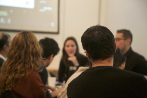 People looking at speaker during water workshop