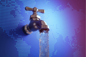 Clean water flowing from faucet attached to purple world map