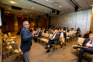 Kenneth Strzepek speaks to attendants seated at the New York Climate Week side-event.
