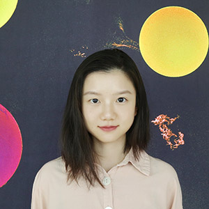 Rhoda Zhang looking straight at camera with slight smile against a colorful backdrop with yellow and pink circles