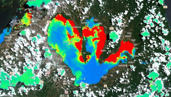 Satellite image of Laguna Lake in heat map colors of red, blue, and green