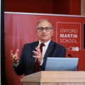 Portrait of Kenneth Strzepek speaking at Oxford