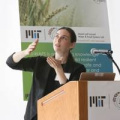 Professor Julia Ortony speaking at a podium at a J-WAFS conference 